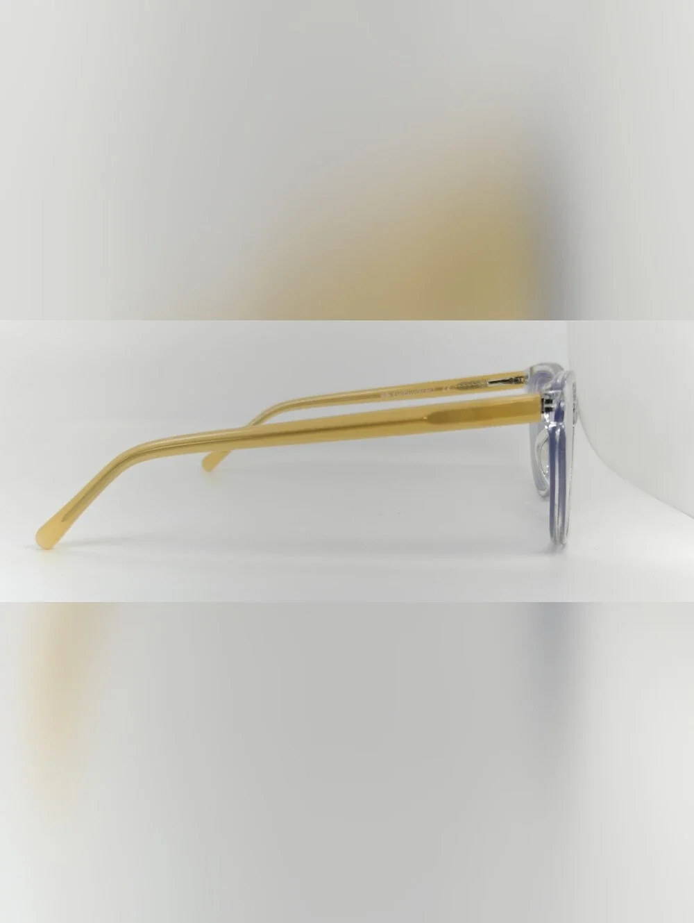Sing. Clear Cat-Eye Reading Glasses with Vanilla Temples. Minimalist.